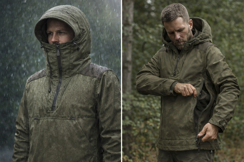 Robuster Roughstuff Bollwerk Loden-Anorak aus schwerem 700g Lodenstoff für Outdoor-Abenteuer, Bushcraft, Jagd und Wintertouren. Der lange, weit geschnittene Anorak besitzt eine große Kapuze mit Kordelzug, verstärkte Schultern und Ärmel aus gewachster Baumwolle sowie eine große Kängurutasche. Wind- und wasserabweisendes Naturmaterial in funktionalem Outdoor-Design für kalte und anspruchsvolle Wetterbedingungen.